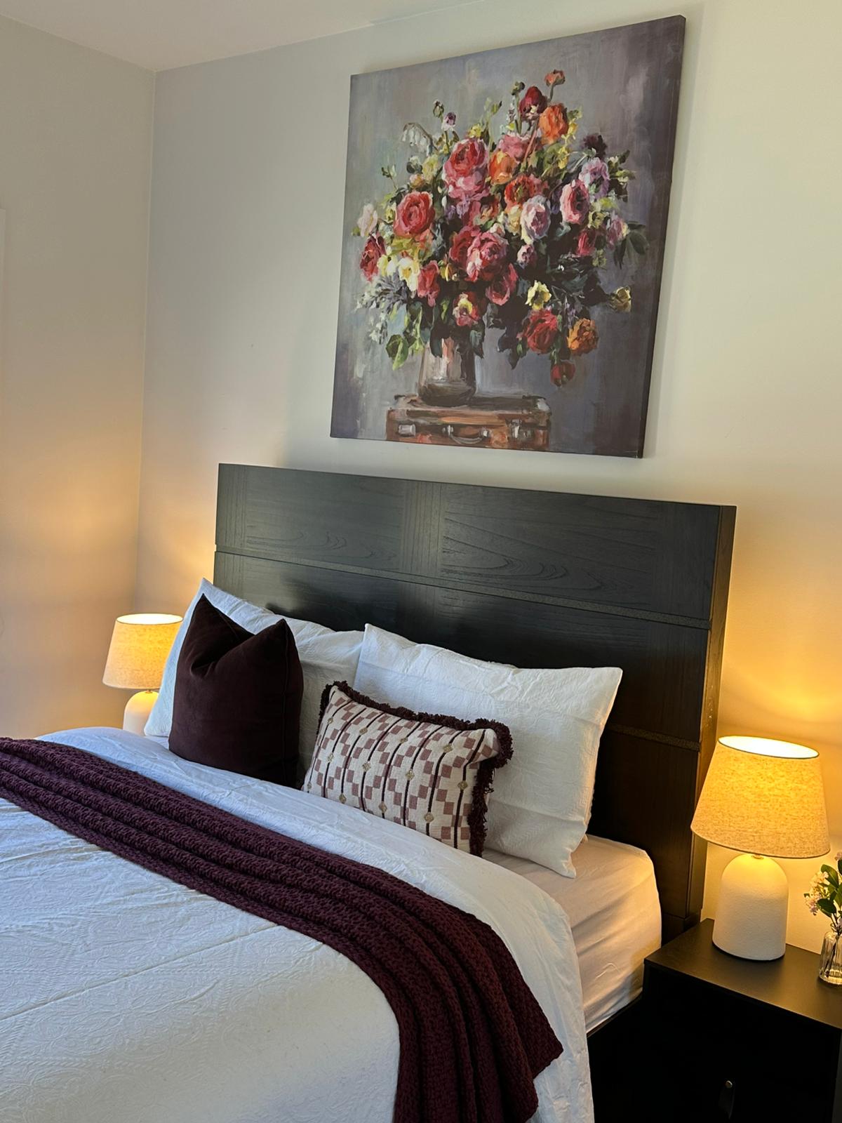 Staged interior with warm lighting and neutral furniture